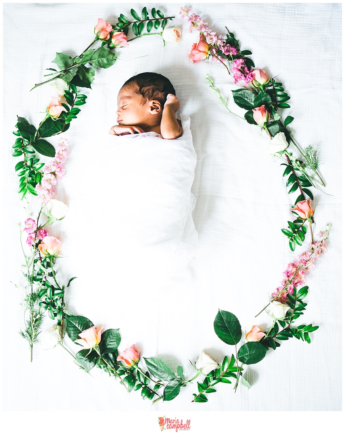 baby in flower wreath.jpg